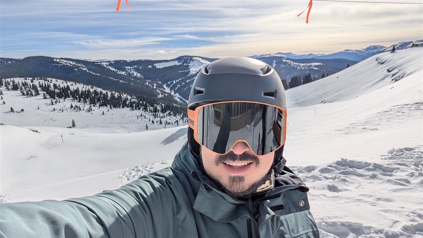 Almaz Dolubaev in snowboarding gear on a snowy mountain slope